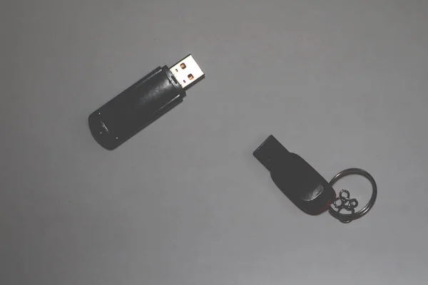 Different Black Flash Drives Gray Background — Stock Photo, Image