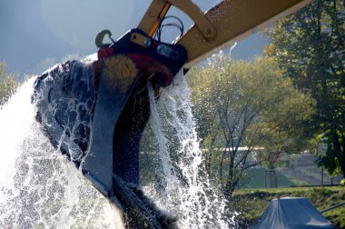 Yellow Excavator for water and mud