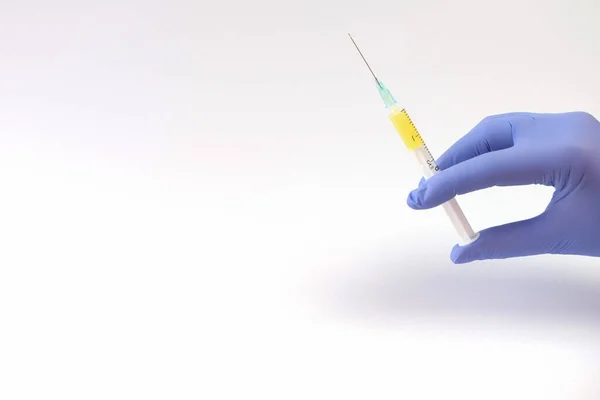 Hand Blue Latex Medical Glove Holds Needle Medicine Injection Antibiotic — Stock Photo, Image