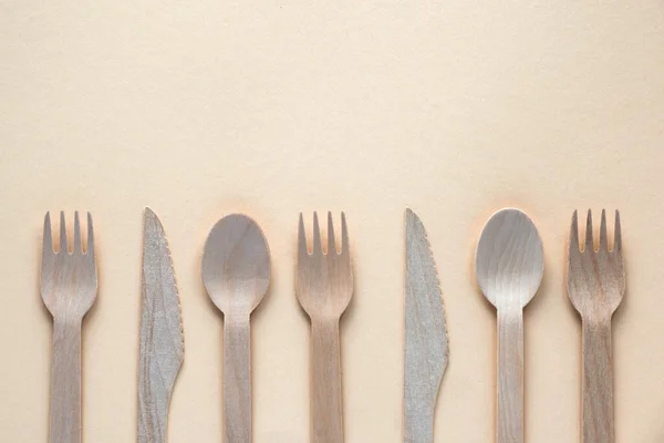 Eco Friendly Biodegradable Wood Cutlery Forks Knife Spoons Beige Background — 스톡 사진
