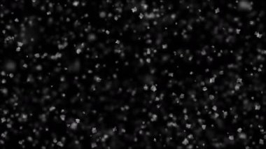 Nazik Noel kar yavaş esinti sorunsuz siyah zemin üzerine düşüyor. Slow Motion 3d animasyon ilmekledi. Alfa mat. 4 k Ultra Hd 3840 x 2160