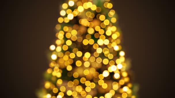 Krásný zlatý nový rok strom světla v Bokeh rozostřeného rozostření. Pozdrav pozadí bezproblémovou 3d animace. Veselé Vánoce a šťastný nový rok oslava konceptu. 4 k Ultra Hd 3840 x 2160