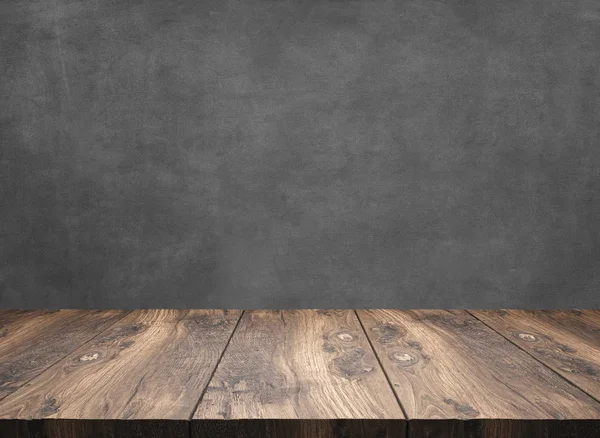 灰色の背景を持つ素朴な木製のテーブル — ストック写真