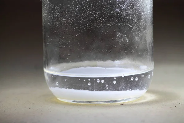 White Power Reacing in Liquid — стоковое фото