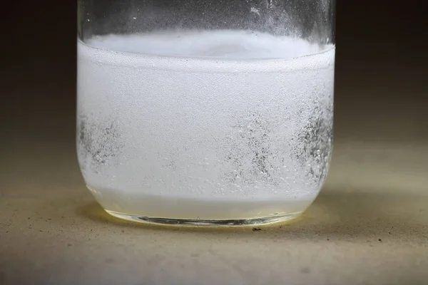 stock image White Powder Reacting in Liquid