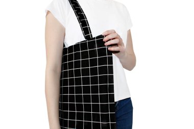 Trendy Alışveriş çantası. Siyah boş pamuk eko çanta. Çevre Koruma Geri Dönüşüm Kavramı. Taşıyıcı geri dönüşüm bakkal çantası. Siyah pamuk torba beyaz arka plan üzerinde izole. Plastik ücretsiz ürünler.