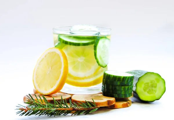 Food for fitness, healthy lifestyle frame flat lay with cucumber and lemon. With space for your text.Infused detox water with cucumber, lemon. cucumber and lemon water.Slimming and excretion of slag.
