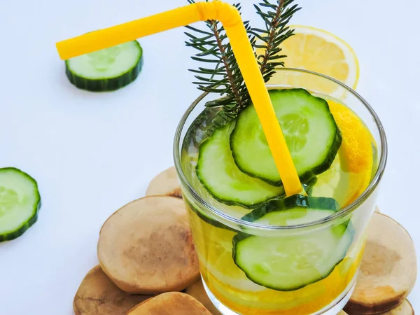 Food for fitness, healthy lifestyle frame flat lay with cucumber and lemon. With space for your text.Infused detox water with cucumber, lemon. cucumber and lemon water.Slimming and excretion of slag.