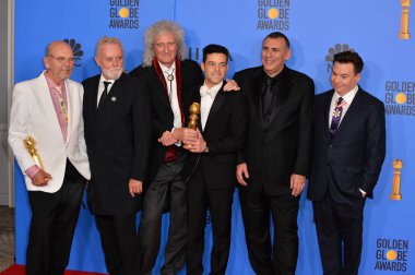 Jim Beach, Roger Taylor ve Brian May Kraliçe, Rami Malek, Graham King & Mike Myers