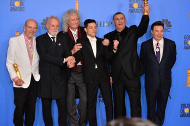Jim Beach, Roger Taylor ve Brian May Kraliçe, Rami Malek, Graham King & Mike Myers