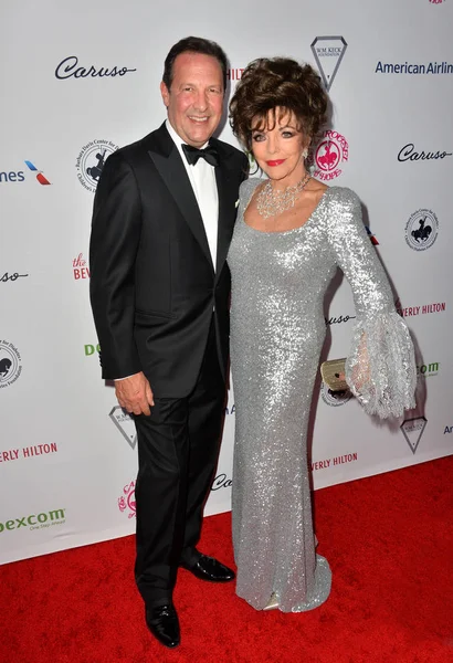 Joan Collins & Percy Gibson — Stock Photo, Image