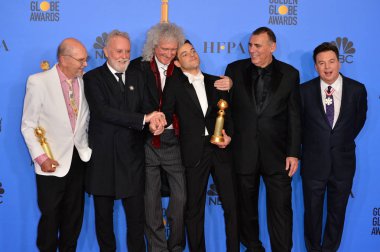 Jim Beach, Roger Taylor ve Brian May Kraliçe, Rami Malek, Graham King & Mike Myers
