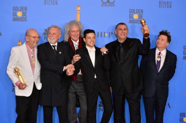 Jim Beach, Roger Taylor ve Brian May Kraliçe, Rami Malek, Graham King & Mike Myers