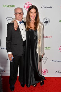 Robert Gerner & Janice Dickinson