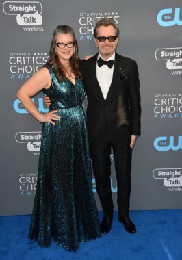 Gary Oldman & Gisele Schmidt