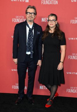 Gary Oldman & Gisele Schmidt 