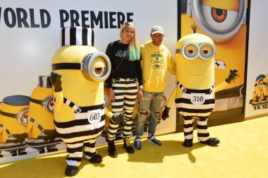 Pharrell Williams & Helen Lasichanh