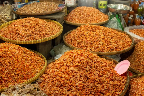 Several bags of dried shrimp for sale at Asian food market — Stock Photo, Image