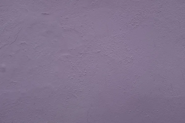 Крупним планом фото зовнішньої стіни, пофарбованої в фіолетову текстуру, поверхня з ліпниною, відмінно підходить для фону — стокове фото