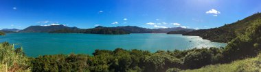 Scenic view of Marlborough Sounds surrounded by green mountains, New Zealand  clipart