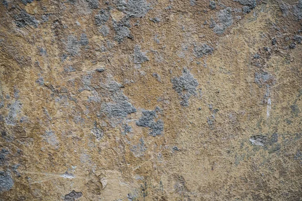 Textura de uma parede velha coberta de tinta. Imagem de fundo de um — Fotografia de Stock