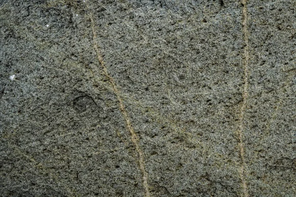 Η υφή της πέτρας που είναι κατάφυτη με βρύα. Εικόνα φόντου o — Φωτογραφία Αρχείου