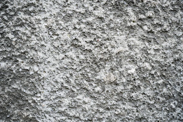 Texture di un vecchio muro di cemento incrinato. Immagine di sfondo di un w — Foto Stock