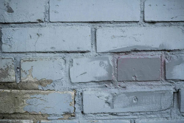 Texture of an old paint covered brick wall. Background image of — Stock Photo, Image