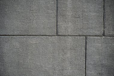 Eski bir çatlak beton duvarın dokusu. W'nin arka plan görüntüsü