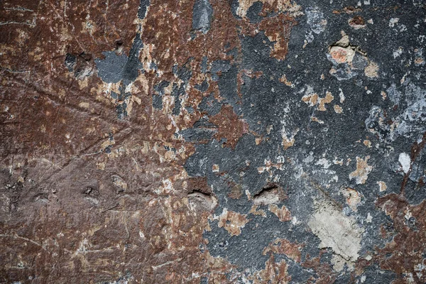 Textura de una vieja pared cubierta de pintura. Imagen de fondo de una — Foto de Stock