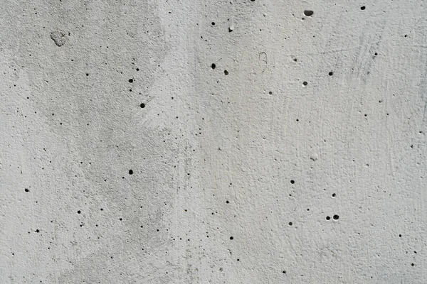 Photo texture of concrete slab covered with white paint