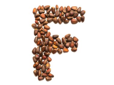 Ayrı nesne: Olgun çam fıstıklarıyla kaplanmış mektup