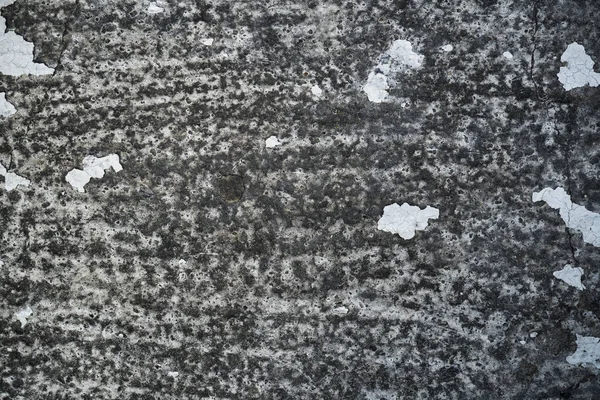 Textura de uma antiga parede de concreto rachado. Imagem de fundo de um w — Fotografia de Stock