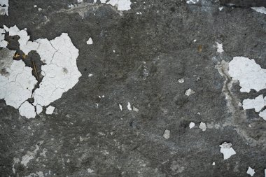 Eski bir çatlak beton duvarın dokusu. W'nin arka plan görüntüsü