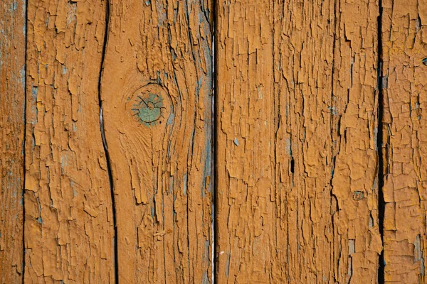 木製の柵の背景画像 塗装木の質感 古い絵具の質感 塗料のクラック 木の板 黄身の塗料で塗装古いフェンス テキスト空間 — ストック写真