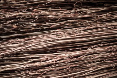 Saman süpürge dokusu. Makro saman. Samanlık bir yapının arkaplan görüntüsü. Yakın çekim.