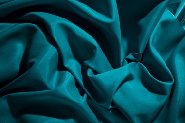 Buruşuk kumaşın arkaplan resmi. Mavi ipek