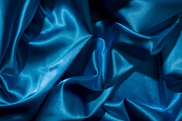 stock image Background image of crumpled fabric. Blue silk