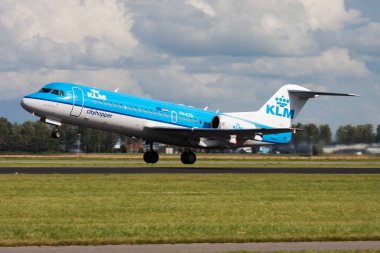 KLM Fokker 70 PH-KZS passenger plane departure at Amsterdam Schipol Airport clipart