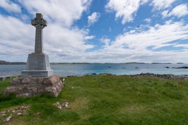 Celtic cross war memorial on Iona, Scotland clipart