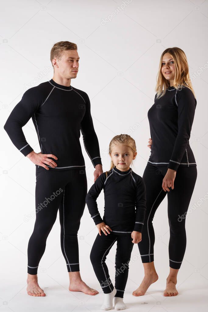 Family in thermal underwear on a white background. Sportswear.