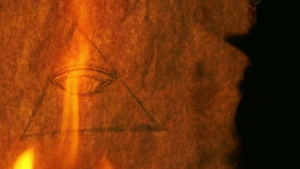 Symbole Illuminati Sur Vieux Papier Brûlant — Video