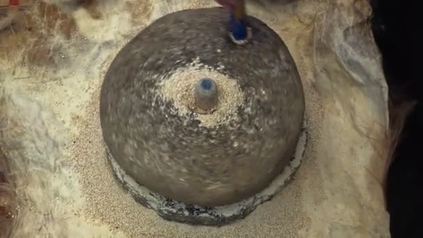 Crushing Wheat Turning Stone Make Flour — Stock Video