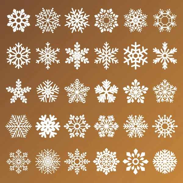 Collectie van gouden vector sneeuwvlokken op witte achtergrond — Stockvector