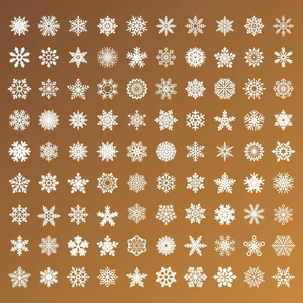 Collection of golden vector snowflakes on white background — Stock Vector