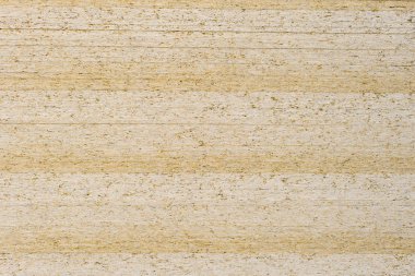 Katlanmış yonga levhalardan bej arka plan. Preslenmiş talaşahşap arka plan.