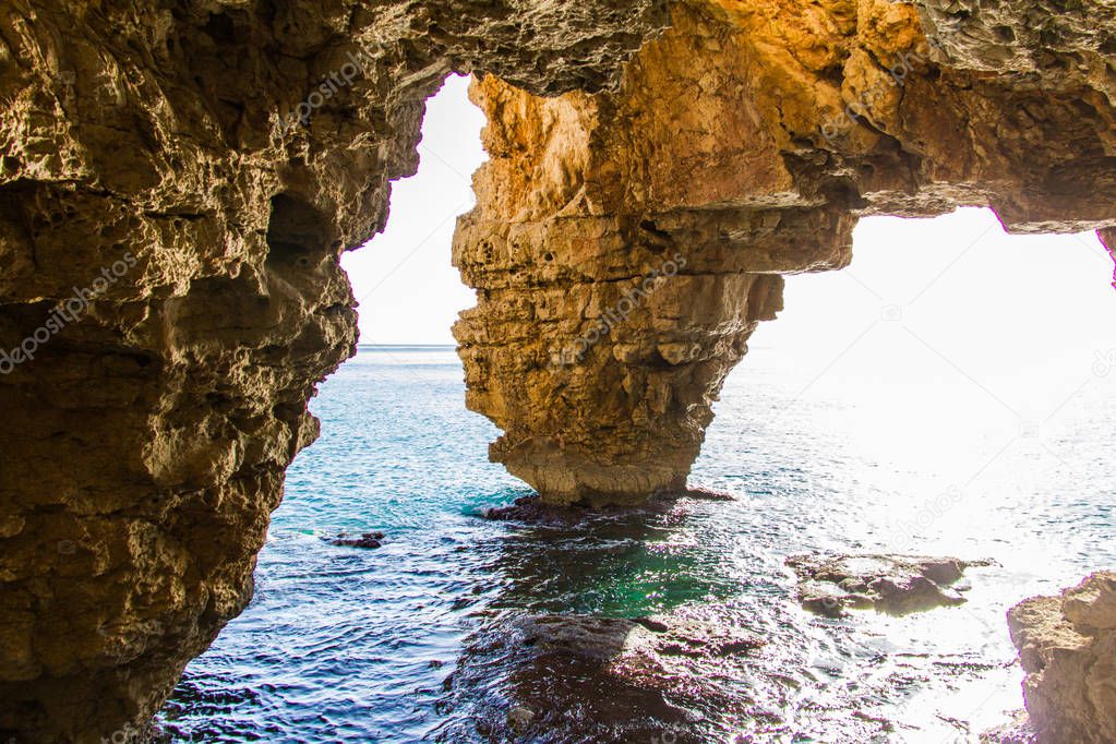 Cova dels Arcs cave, at Moraig cove beach, in Benitatxell, Alica