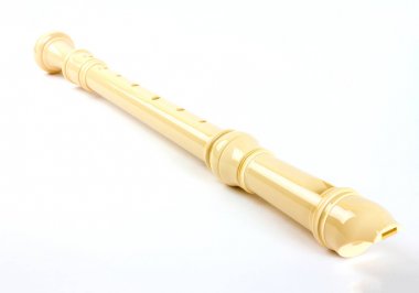 Plastic alto recorder flute, isolated on white background clipart