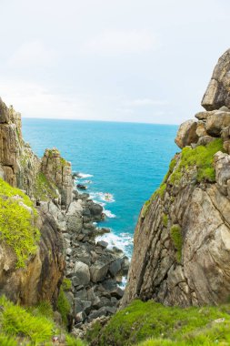 Dai Lanh cape Point, MUI Dien, Phu Yen Eyaleti, Viet nam'en doğudaki kayalık uçurum ile saf deniz