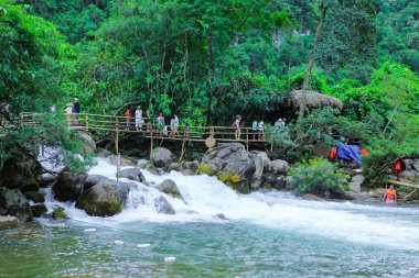 Quang Binh, Vietnam - July 13, 2018: Nuoc Mooc spring - Mooc stream Phong Nha Ke Bang national park